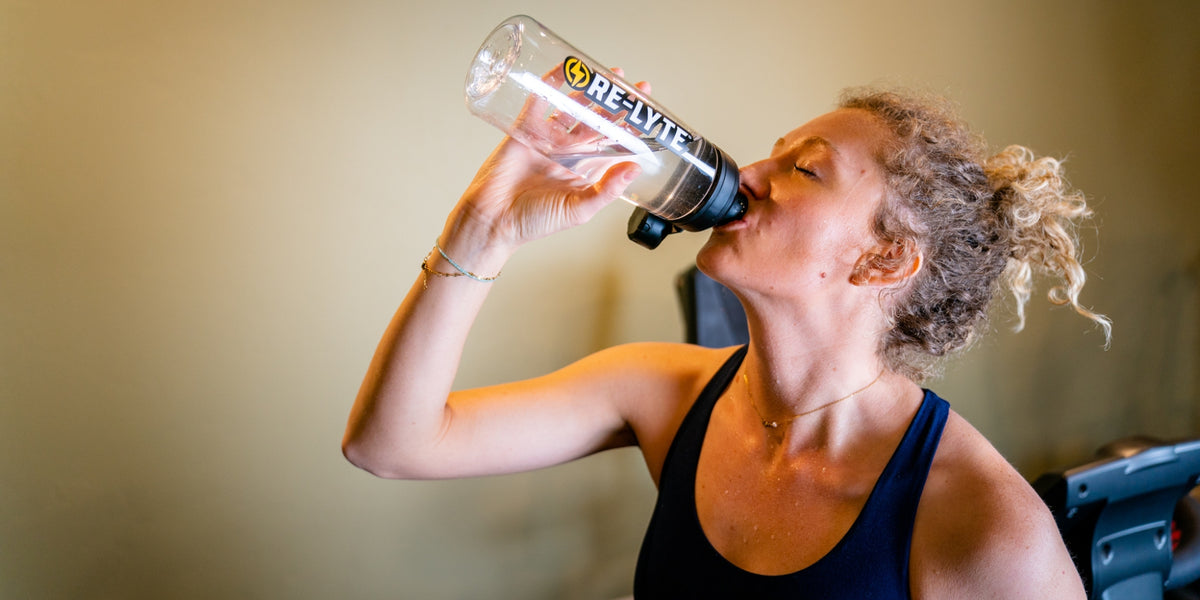 Nat Drinking water from a water bottle 