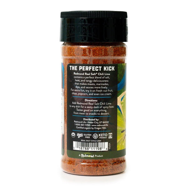 Redmond Real Salt Chili Lime Seasoning Jar displays a vibrant green label with product information. 
