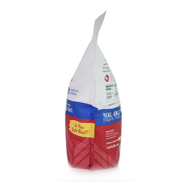Redmond Real Salt bag stands upright, showcasing its nutritional information and "Mined in America" label. 
