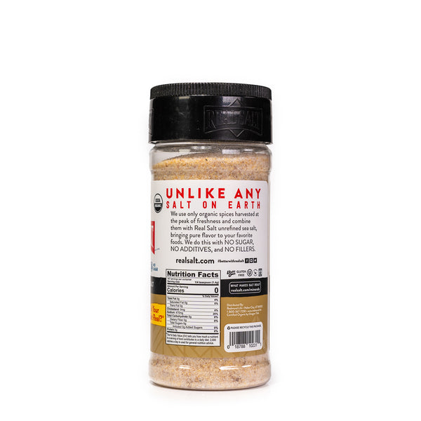 Clear shaker of Real Salt organic seasoning displays the nutritional information and ingredients against a white background.