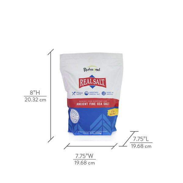 Redmond Real Salt brand Ancient Fine Sea Salt bag against a white background. 
